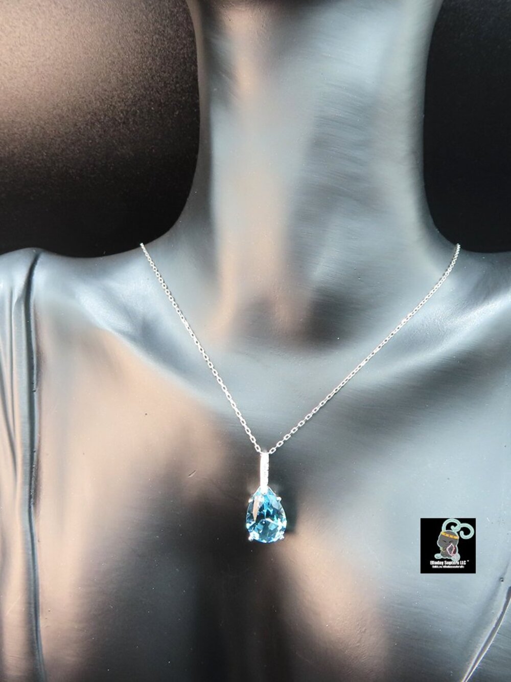 Blue CZ Pear Shaped Pendant Necklace in Sterling Silver 15.5 - 16.5"